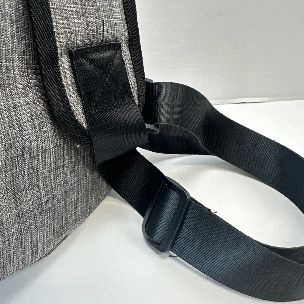 NuPouch Gray Crossbody Sling Bag with USB Charging Port Travel Tech Backpack